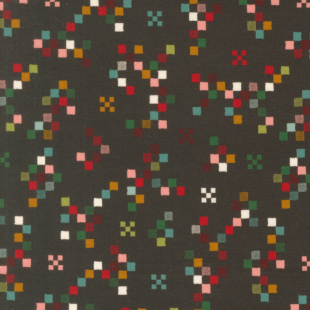 Twinkle and Tinsel by Fancy That Design House cotton quilting fabric features colorful pixelated squares on charcoal.
