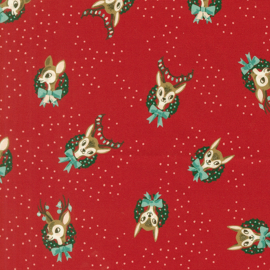 Christmas deer in wreaths on red cotton quilting fabric. Twinkle and Tinsel by Fancy That Design House for Christmas and winter.
