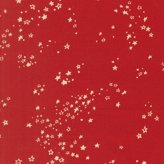 Moda's Christmas red stars cotton quilting fabric from Twinkle and Tinsel by Fancy That Design House, with ivory scattered dots.