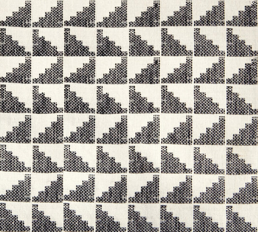 Moda's black and cream stepped geometric cotton quilting fabric. Warp Weft Daisy Days by Ruby Star Society's Alexia Abegg.