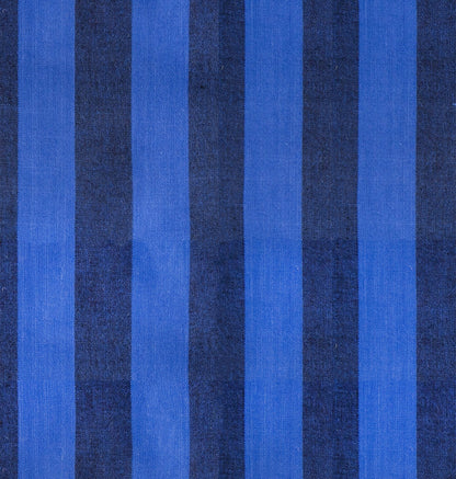 Blue vertical stripes cotton quilting fabric Warp Weft Daisy Days by Ruby Star Society's Alexia Abegg. Alternating wide cobalt and navy blue stripes.