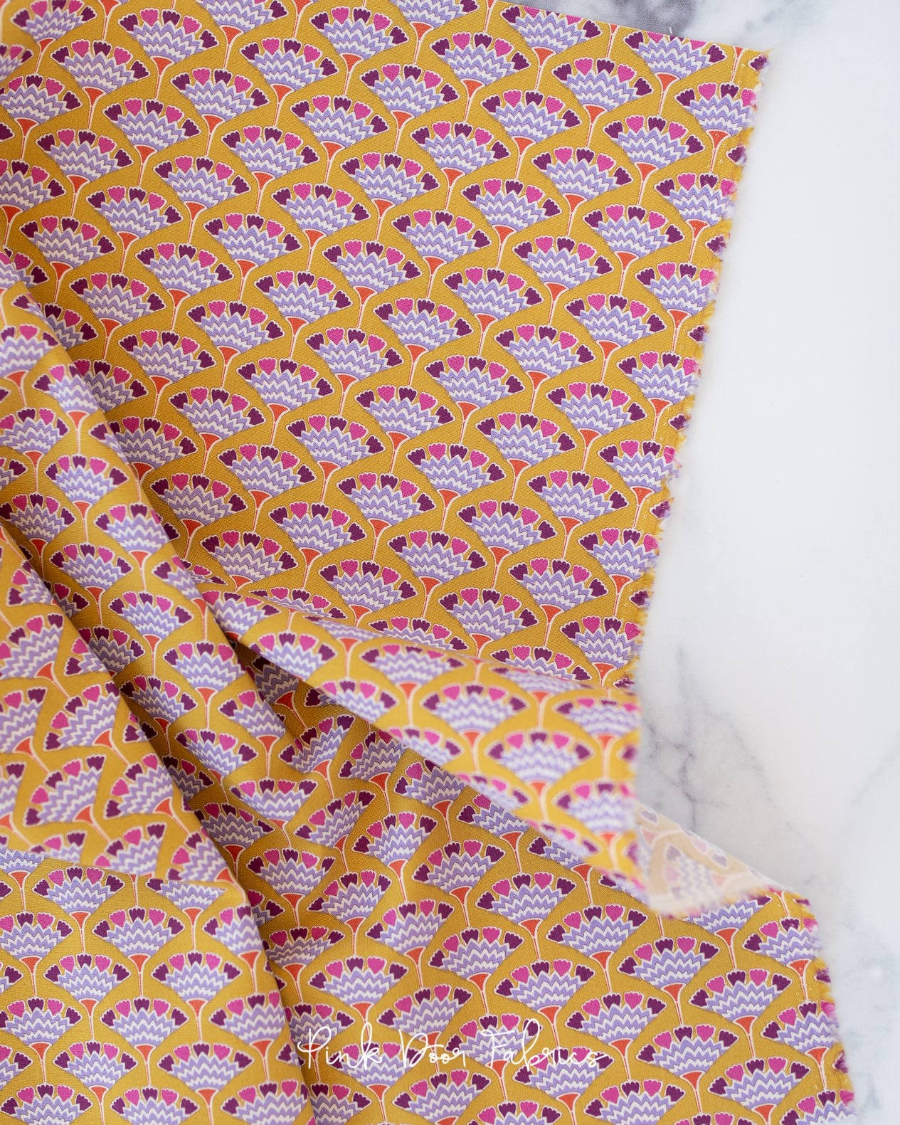 Cotton quilting fabric pattern called 'Tasselflower in Mustard'. Part of the 'Pie in the Sky' fabric collection. Designed by Tilda Fabrics for fabric company Tilda Fabrics. SKU: 100481. 44-45 inch width.