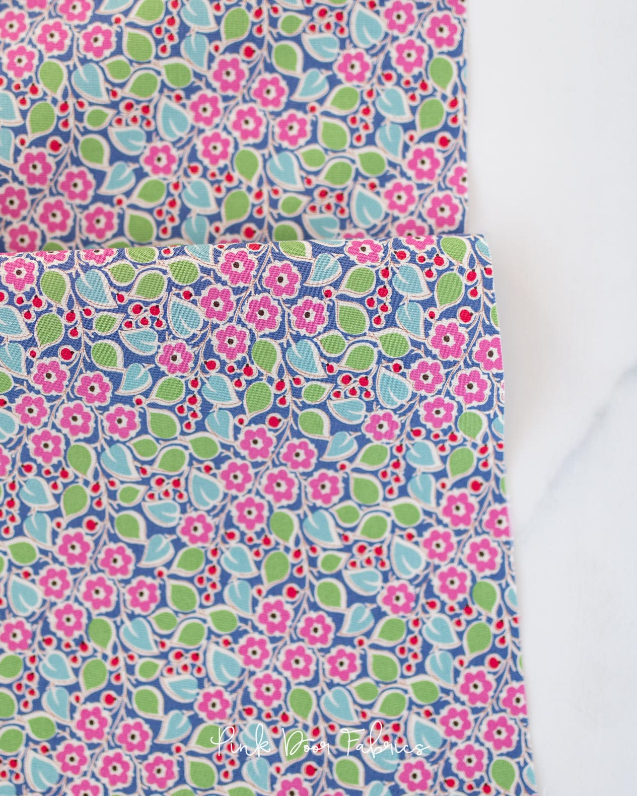 Cotton quilting fabric pattern called 'Topsy Turvy in Blue'. Part of the 'Pie in the Sky' fabric collection. Designed by Tilda Fabrics for fabric company Tilda Fabrics. SKU: 100490. 44-45 inch width.