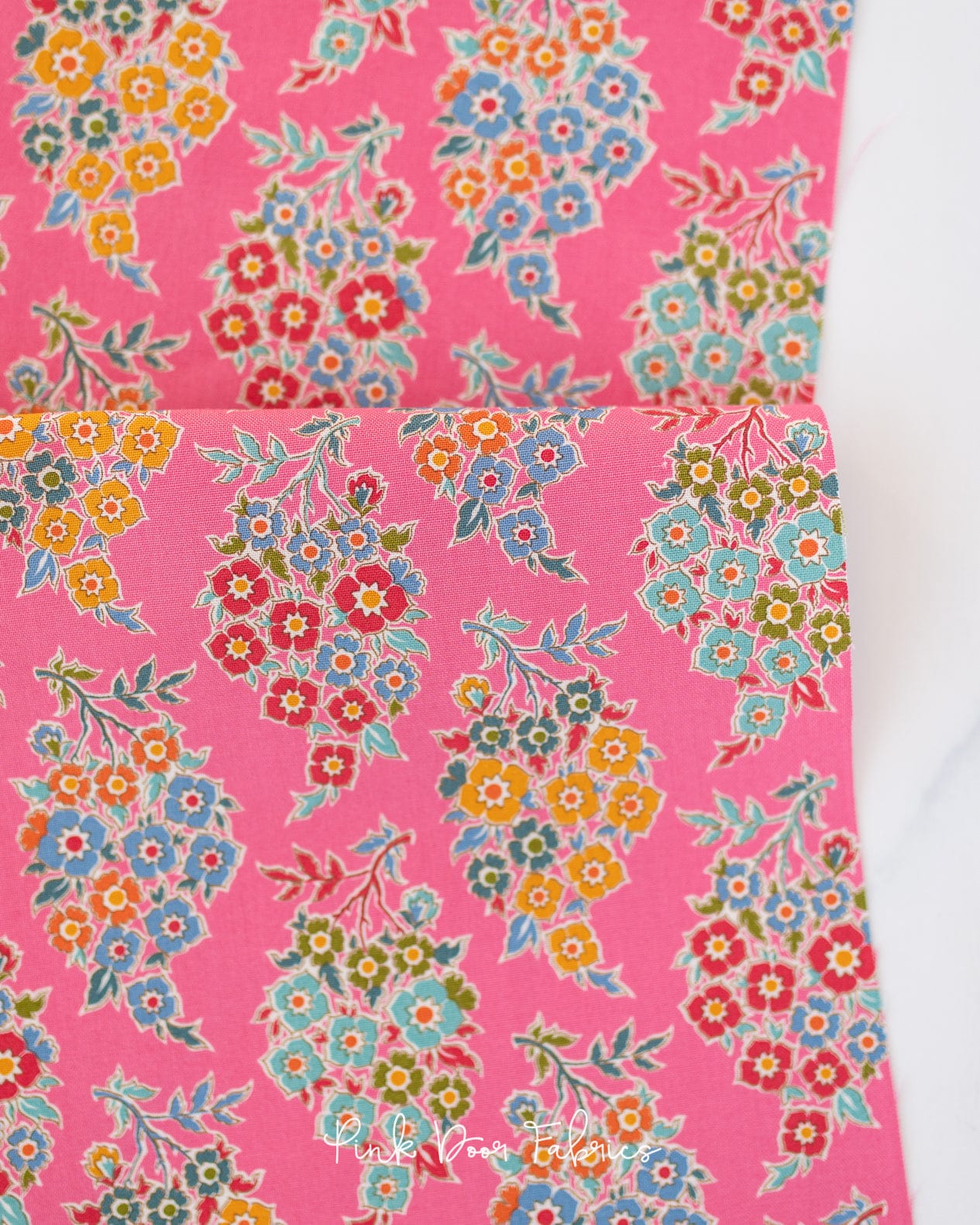Cotton quilting fabric pattern called 'Willy Nilly in Pink'. Part of the 'Pie in the Sky' fabric collection. Designed by Tilda Fabrics for fabric company Tilda Fabrics. SKU: 100494. 44-45 inch width.