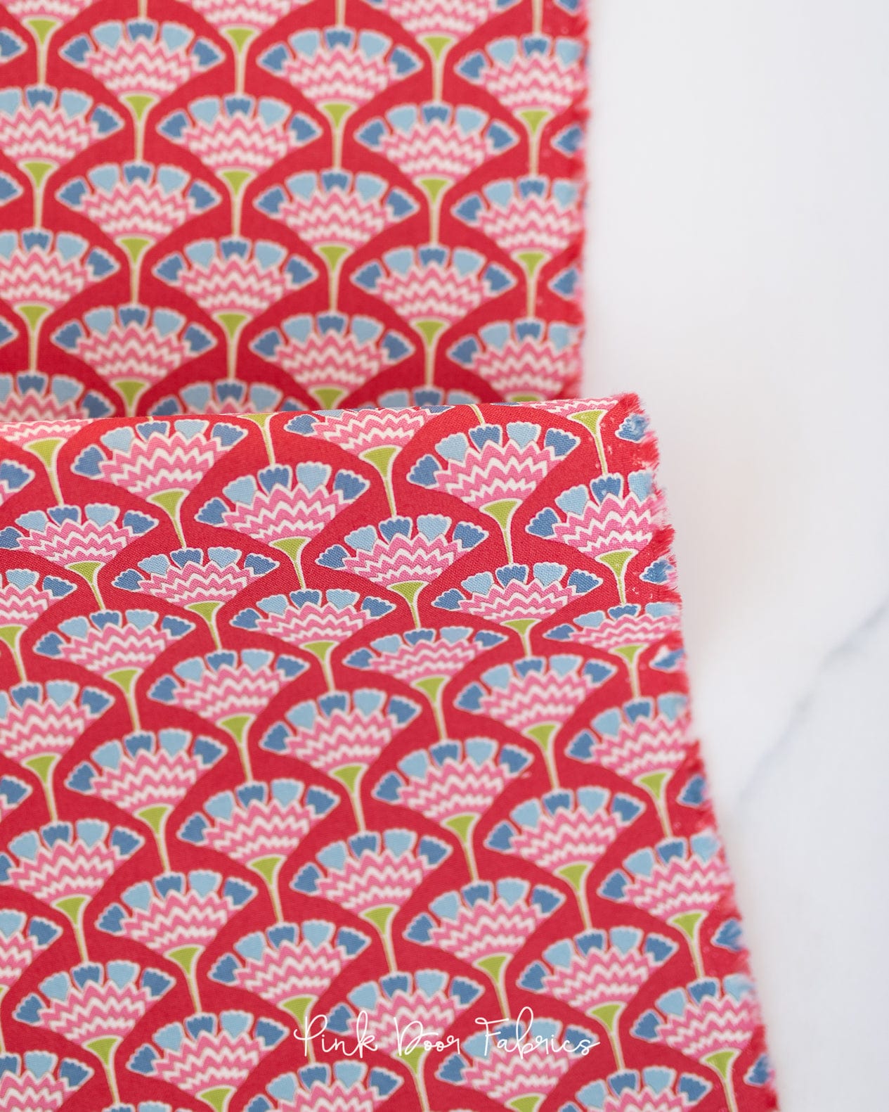 Cotton quilting fabric pattern called 'Tasselflower in Red'. Part of the 'Pie in the Sky' fabric collection. Designed by Tilda Fabrics for fabric company Tilda Fabrics. SKU: 100495. 44-45 inch width.