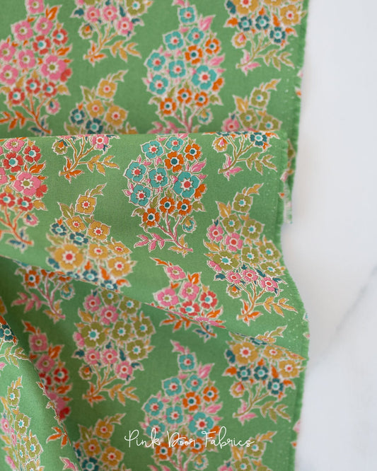 Cotton quilting fabric pattern called 'Willy Nilly in Green'. Part of the 'Pie in the Sky' fabric collection. Designed by Tilda Fabrics for fabric company Tilda Fabrics. SKU: 100496. 44-45 inch width.