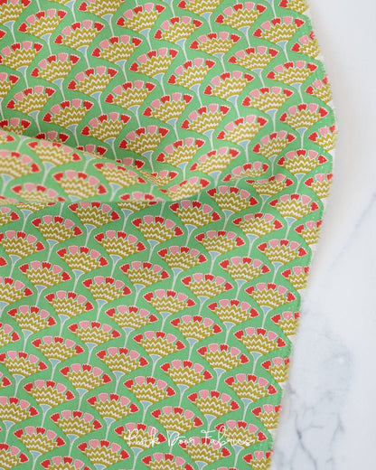 Cotton quilting fabric pattern called 'Tasselflower in Green'. Part of the 'Pie in the Sky' fabric collection. Designed by Tilda Fabrics for fabric company Tilda Fabrics. SKU: 100497. 44-45 inch width.