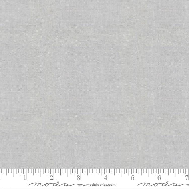 Cotton quilting fabric pattern called 'Crossweave in Grey'. Part of the 'Crossweave' fabric collection. Designed by Moda Fabrics for fabric company Moda Fabrics. SKU: 12216 33. 44-45 inch width.