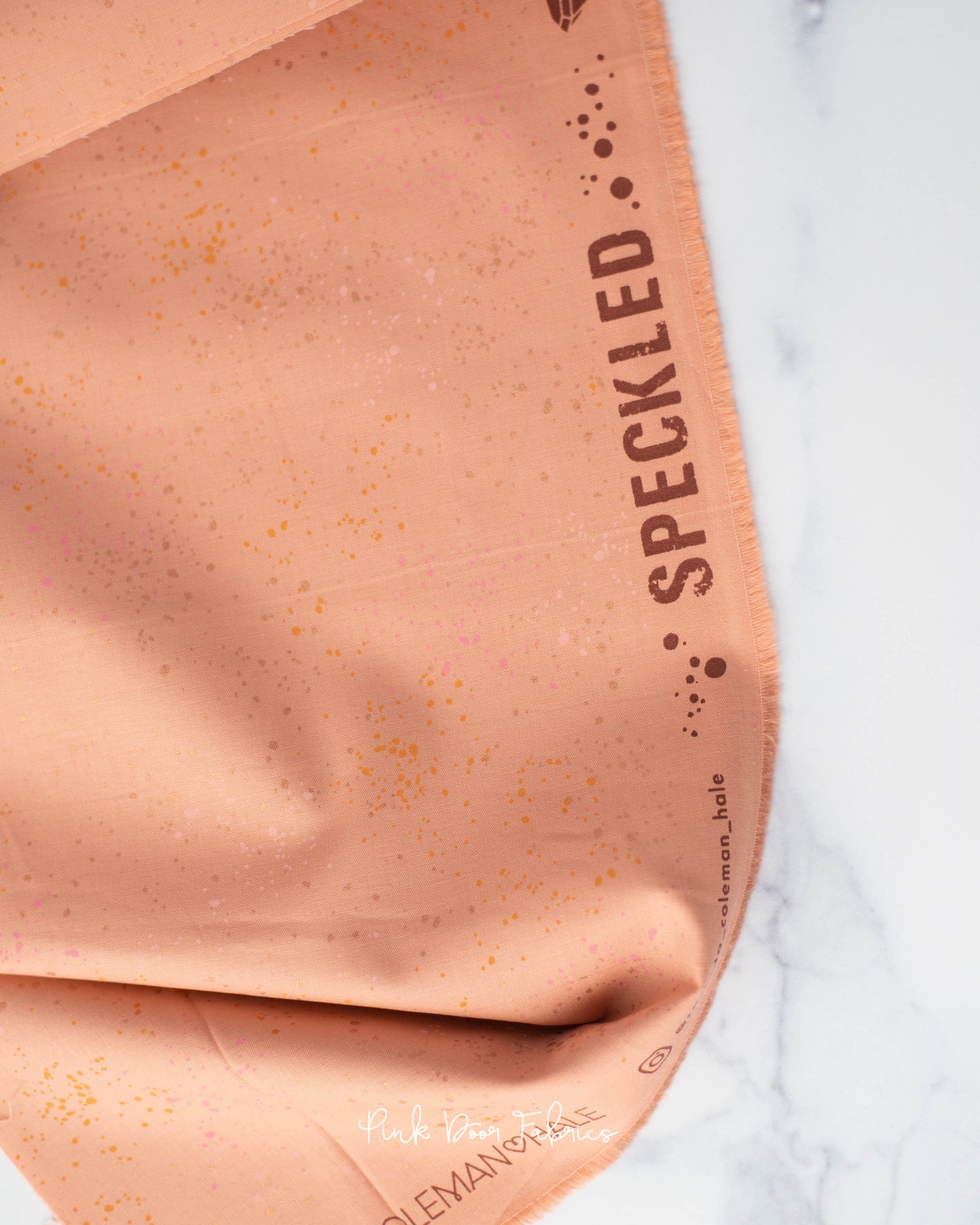 Cotton quilting fabric pattern called 'Melon'. Part of the 'Speckled Metallic' fabric collection. Designed by Ruby Star Society for fabric company Moda Fabrics. SKU: RS5027 93M. 44-45 inch width.