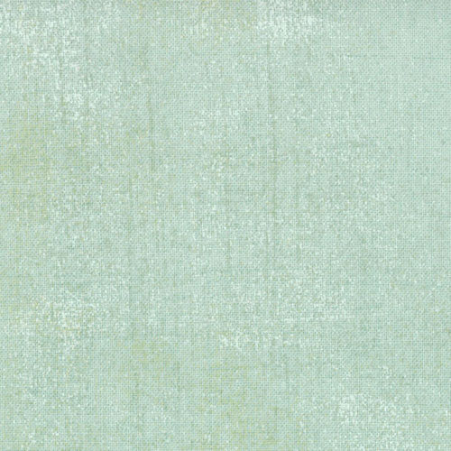 Cotton quilting fabric pattern called 'Grunge in Mint'. Part of the 'Grunge Basics' fabric collection. Designed by Basic Grey for fabric company Moda Fabrics. SKU: 30150 155. 44-45 inch width.