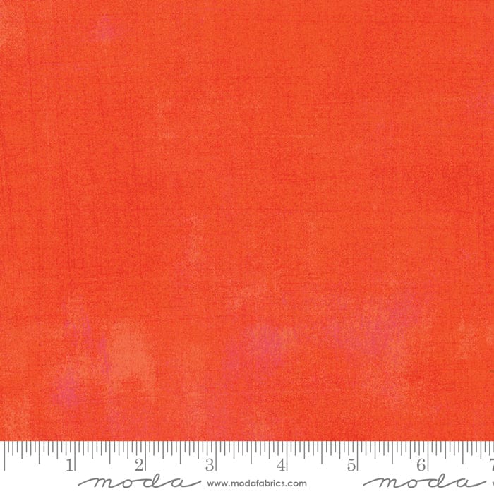 Cotton quilting fabric pattern called 'Grunge in Tangerine'. Part of the 'Grunge Basics' fabric collection. Designed by Basic Grey for fabric company Moda Fabrics. SKU: 30150 263. 44-45 inch width.