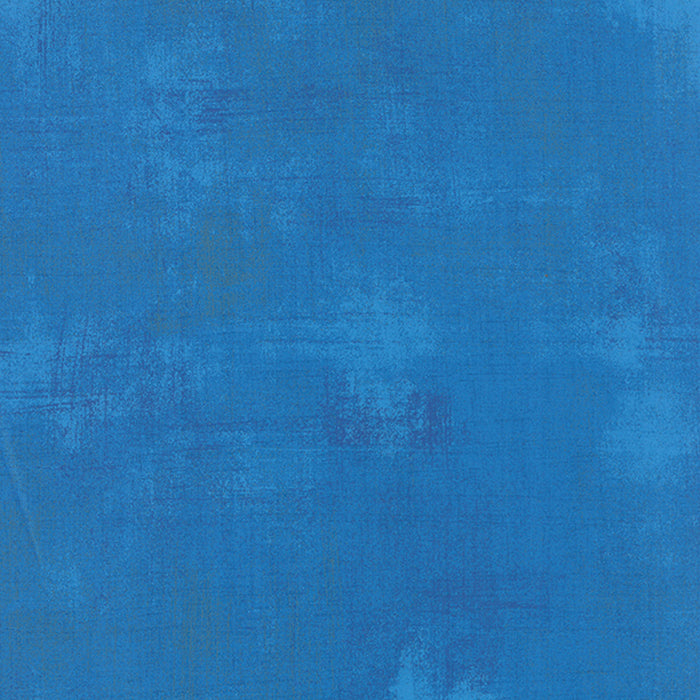 Cotton quilting fabric pattern called 'Grunge in Bright Sky'. Part of the 'Grunge Basics' fabric collection. Designed by Basic Grey for fabric company Moda Fabrics. SKU: 30150-299. 44-45 inch width.