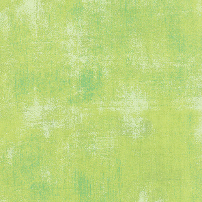 Cotton quilting fabric pattern called 'Grunge in Key Lime'. Part of the 'Grunge Basics' fabric collection. Designed by Basic Grey for fabric company Moda Fabrics. SKU: 30150 303. 44-45 inch width.