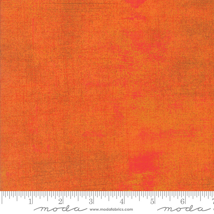 Cotton quilting fabric pattern called 'Grunge in Russett Orange'. Part of the 'Grunge Basics' fabric collection. Designed by Basic Grey for fabric company Moda Fabrics. SKU: 30150 322. 44-45 inch width.
