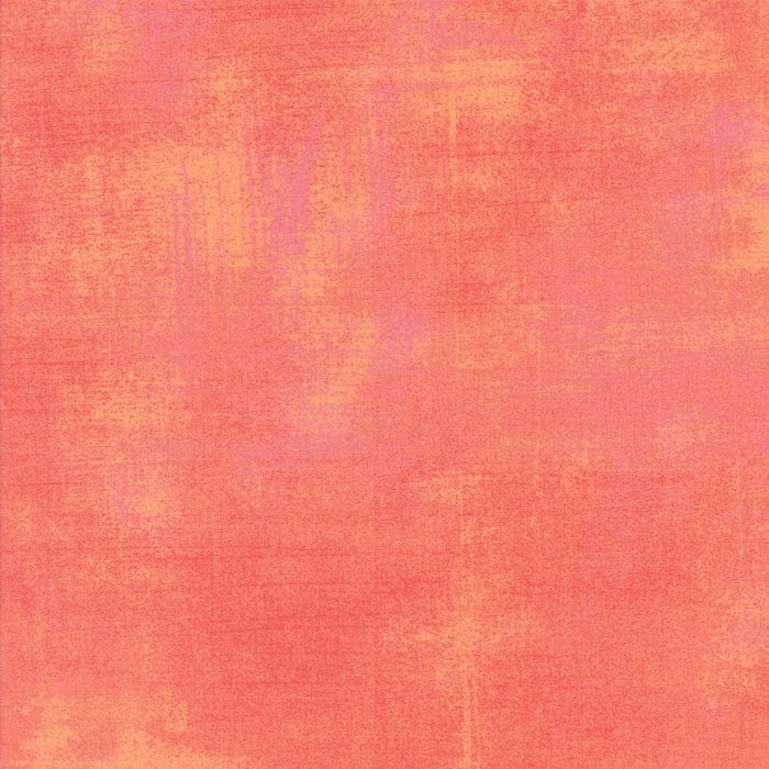 Cotton quilting fabric pattern called 'Grunge in Papaya Punch'. Part of the 'Grunge Basics' fabric collection. Designed by Basic Grey for fabric company Moda Fabrics. SKU: 30150 323. 44-45 inch width.