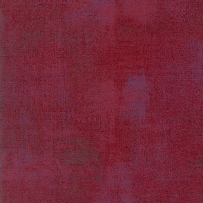 Cotton quilting fabric pattern called 'Grunge in Beet Red'. Part of the 'Grunge Basics' fabric collection. Designed by Basic Grey for fabric company Moda Fabrics. SKU: 30150-334. 44-45 inch width.