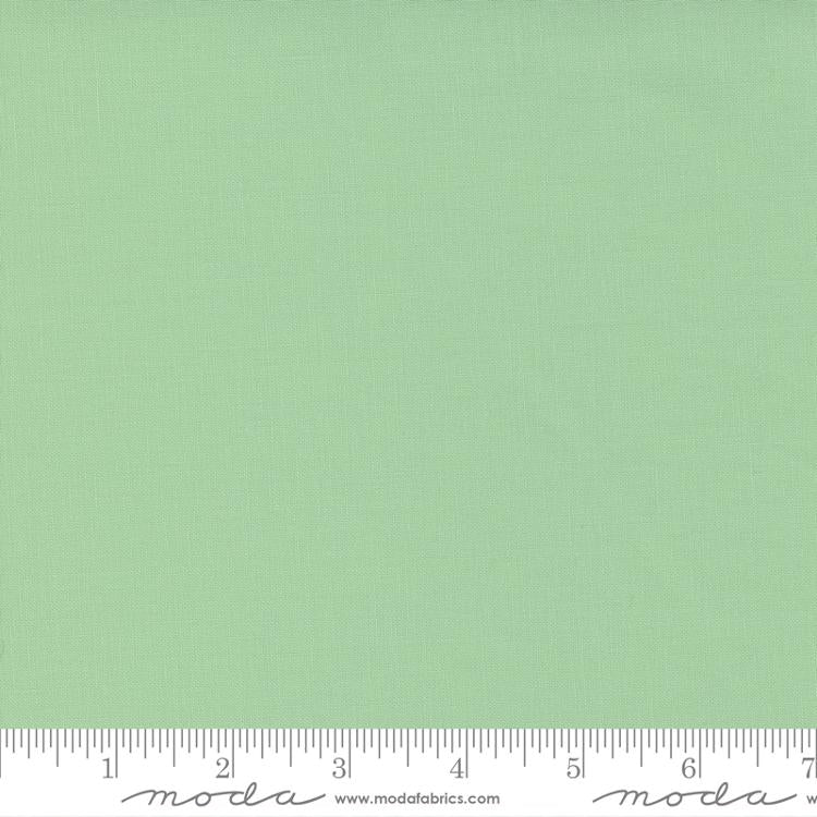Cotton quilting fabric pattern called 'Mint'. Part of the 'Bella Solids' fabric collection. Designed by Moda Fabrics for fabric company Moda Fabrics. SKU: 9900 133. 44-45 inch width.