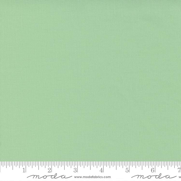 Cotton quilting fabric pattern called 'Mint'. Part of the 'Bella Solids' fabric collection. Designed by Moda Fabrics for fabric company Moda Fabrics. SKU: 9900 133. 44-45 inch width.