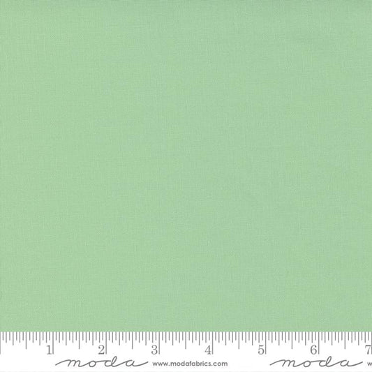 Cotton quilting fabric pattern called 'Mint'. Part of the 'Bella Solids' fabric collection. Designed by Moda Fabrics for fabric company Moda Fabrics. SKU: 9900 133. 44-45 inch width.