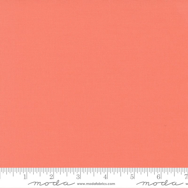 Cotton quilting fabric pattern called 'Coral'. Part of the 'Bella Solids' fabric collection. Designed by Moda Fabrics for fabric company Moda Fabrics. SKU: 9900 147. 44-45 inch width.