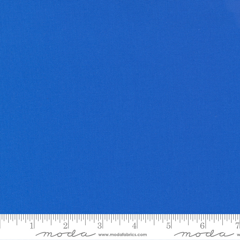 Cotton quilting fabric pattern called 'Amelia Blue'. Part of the 'Bella Solids' fabric collection. Designed by Moda Fabrics for fabric company Moda Fabrics. SKU: 9900 167. 44-45 inch width.