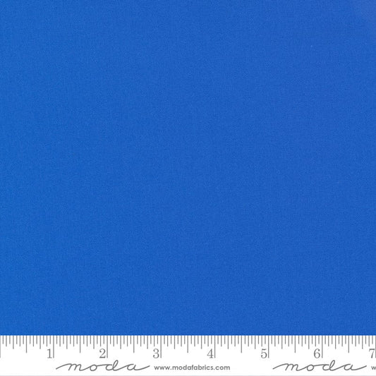 Cotton quilting fabric pattern called 'Amelia Blue'. Part of the 'Bella Solids' fabric collection. Designed by Moda Fabrics for fabric company Moda Fabrics. SKU: 9900 167. 44-45 inch width.