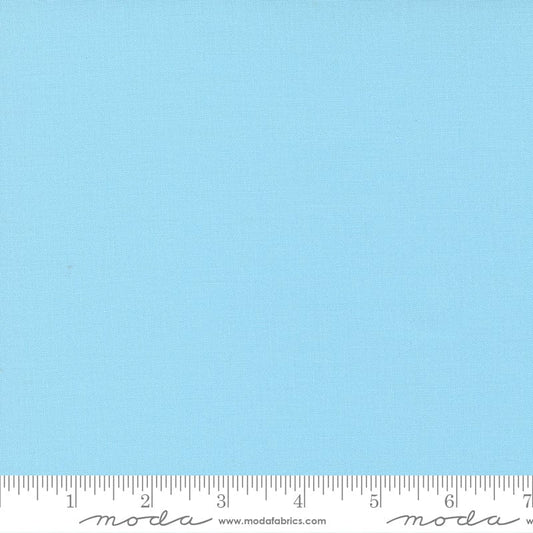 Cotton quilting fabric pattern called 'Tranquil Aqua'. Part of the 'Bella Solids' fabric collection. Designed by Moda Fabrics for fabric company Moda Fabrics. SKU: 9900 186. 44-45 inch width.