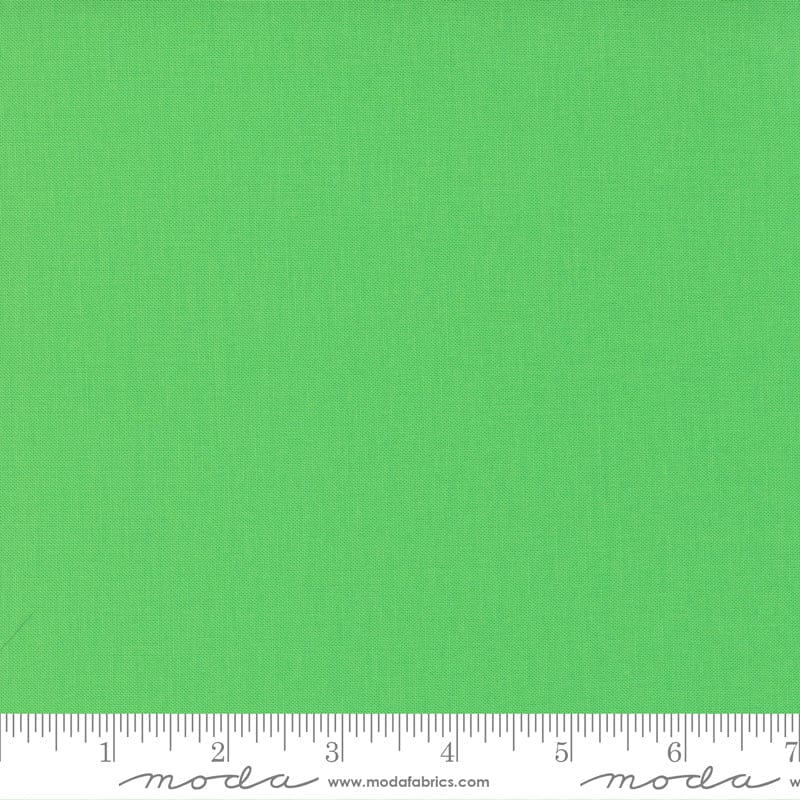 Cotton quilting fabric pattern called 'Kiwi'. Part of the 'Bella Solids' fabric collection. Designed by Moda Fabrics for fabric company Moda Fabrics. SKU: 9900 189. 44-45 inch width.