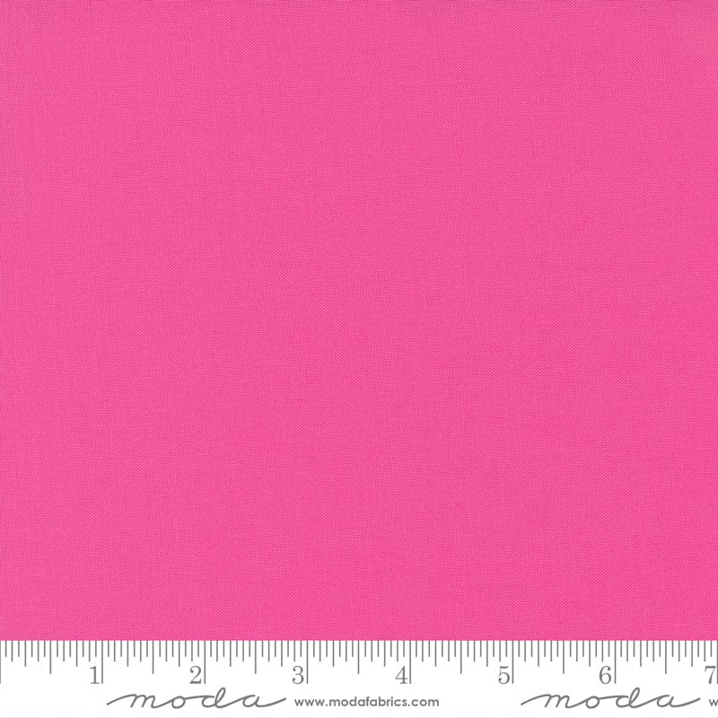 Cotton quilting fabric pattern called 'Fuchsia'. Part of the 'Bella Solids' fabric collection. Designed by Moda Fabrics for fabric company Moda Fabrics. SKU: 9900 190. 44-45 inch width.