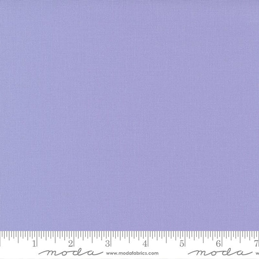 Cotton quilting fabric pattern called 'Wisteria'. Part of the 'Bella Solids' fabric collection. Designed by Moda Fabrics for fabric company Moda Fabrics. SKU: 9900 215. 44-45 inch width.
