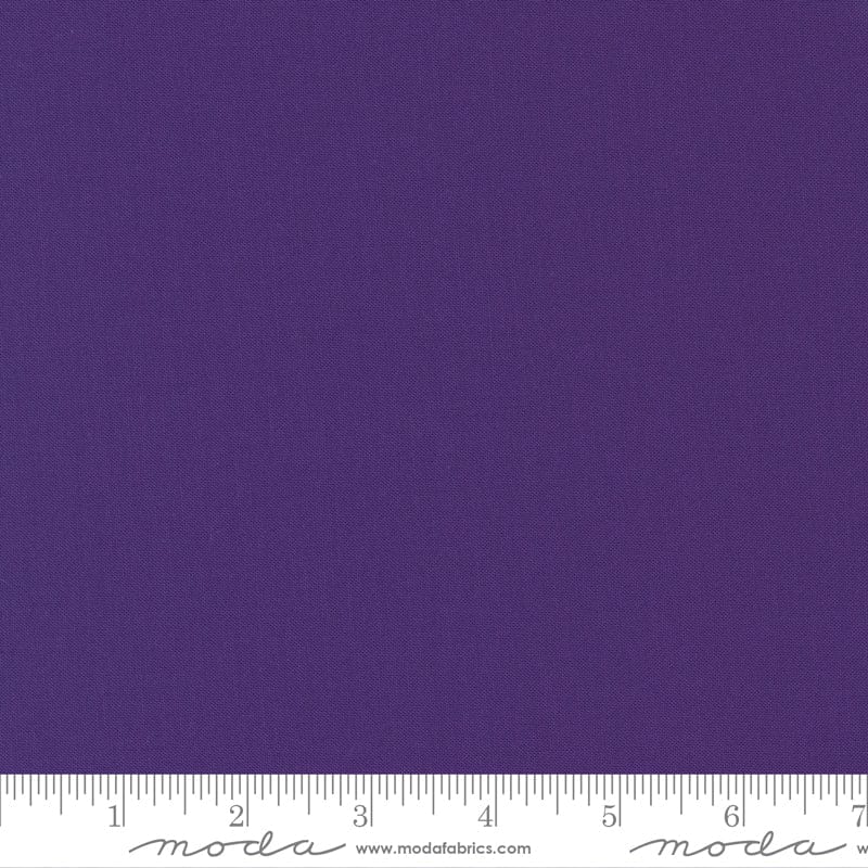 Cotton quilting fabric pattern called 'Purple'. Part of the 'Bella Solids' fabric collection. Designed by Moda Fabrics for fabric company Moda Fabrics. SKU: 9900 21. 44-45 inch width.