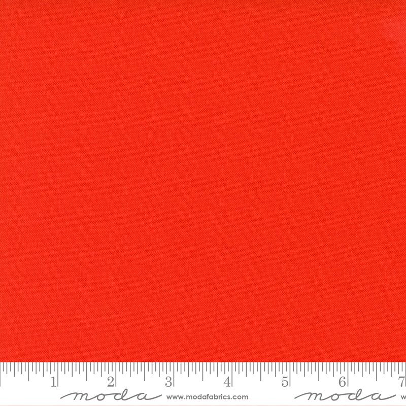 Cotton quilting fabric pattern called 'Mango'. Part of the 'Bella Solids' fabric collection. Designed by Moda Fabrics for fabric company Moda Fabrics. SKU: 9900 222. 44-45 inch width.