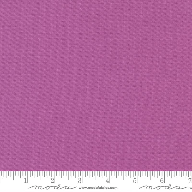 Cotton quilting fabric pattern called 'Violet'. Part of the 'Bella Solids' fabric collection. Designed by Moda Fabrics for fabric company Moda Fabrics. SKU: 9900 224. 44-45 inch width.