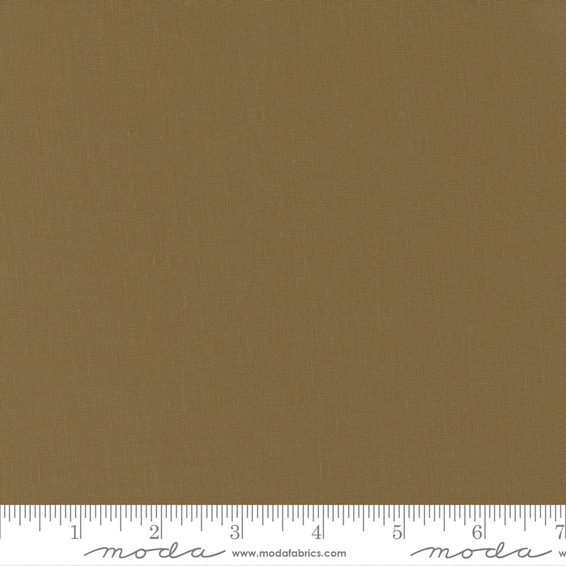 Cotton quilting fabric pattern called 'Toast'. Part of the 'Bella Solids' fabric collection. Designed by Moda Fabrics for fabric company Moda Fabrics. SKU: 9900 246. 44-45 inch width.