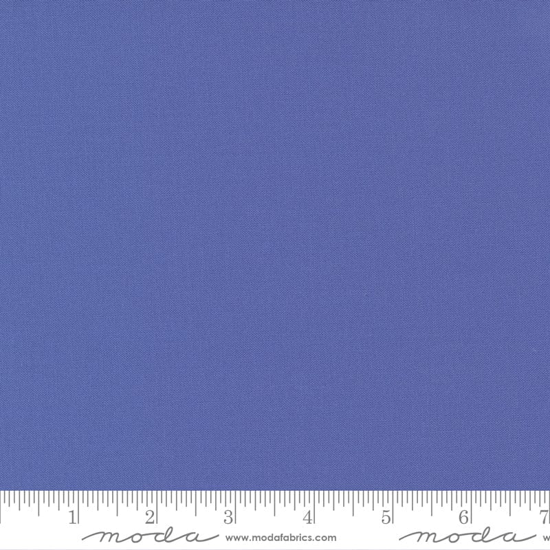 Cotton quilting fabric pattern called 'Periwinkle'. Part of the 'Bella Solids' fabric collection. Designed by Moda Fabrics for fabric company Moda Fabrics. SKU: 9900 260. 44-45 inch width.