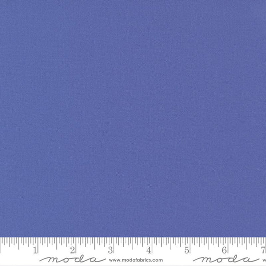 Cotton quilting fabric pattern called 'Periwinkle'. Part of the 'Bella Solids' fabric collection. Designed by Moda Fabrics for fabric company Moda Fabrics. SKU: 9900 260. 44-45 inch width.