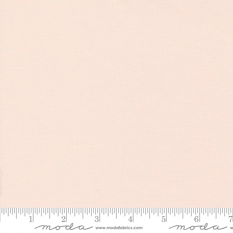 Cotton quilting fabric pattern called 'Pale Pink'. Part of the 'Bella Solids' fabric collection. Designed by Moda Fabrics for fabric company Moda Fabrics. SKU: 9900 26. 44-45 inch width.