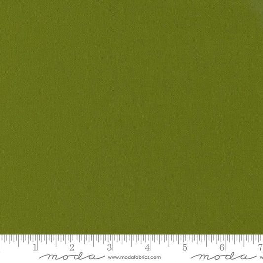 Cotton quilting fabric pattern called 'Avocado'. Part of the 'Bella Solids' fabric collection. Designed by Moda Fabrics for fabric company Moda Fabrics. SKU: 9900 277. 44-45 inch width.