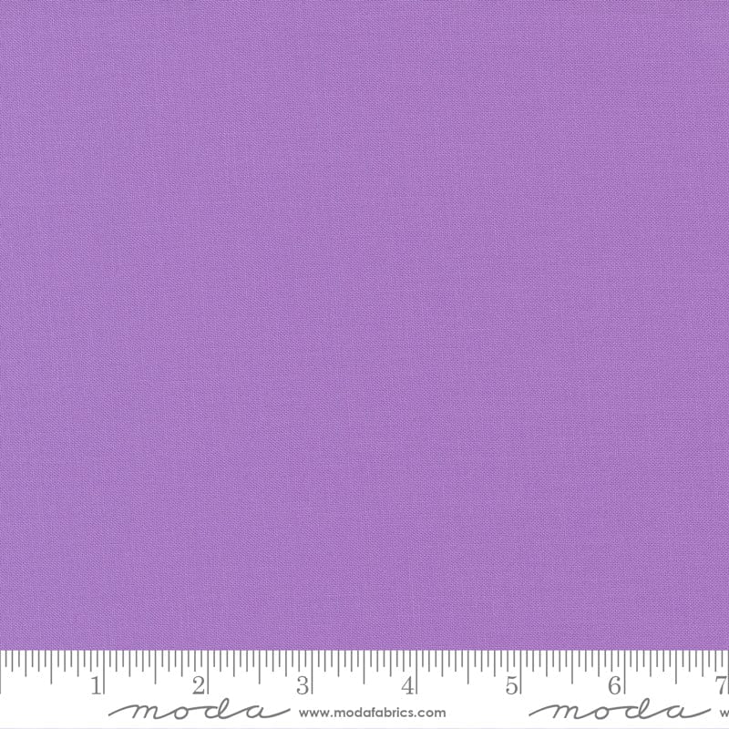 Cotton quilting fabric pattern called 'Sugar Plum'. Part of the 'Bella Solids' fabric collection. Designed by Moda Fabrics for fabric company Moda Fabrics. SKU: 9900 303. 44-45 inch width.