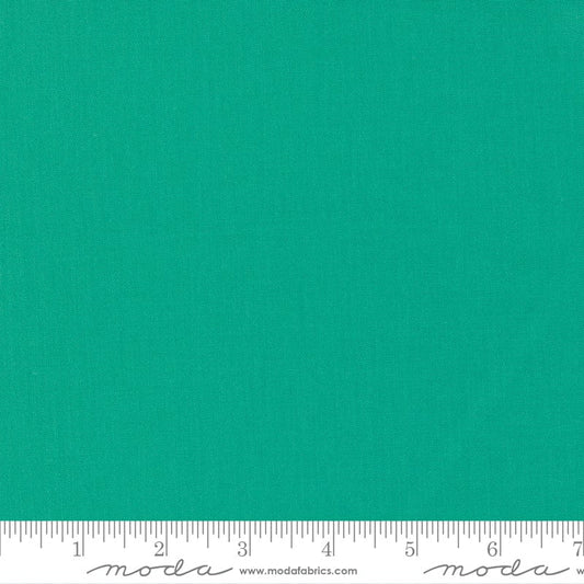 Cotton quilting fabric pattern called 'Spearmint'. Part of the 'Bella Solids' fabric collection. Designed by Moda Fabrics for fabric company Moda Fabrics. SKU: 9900 304. 44-45 inch width.