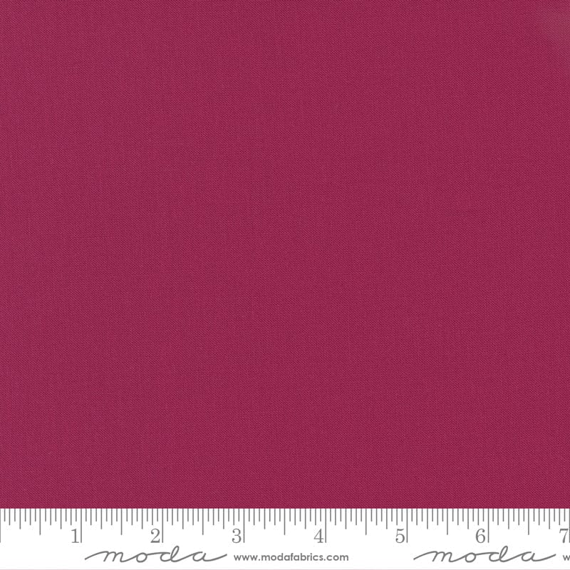 Cotton quilting fabric pattern called 'Garnet'. Part of the 'Bella Solids' fabric collection. Designed by Moda Fabrics for fabric company Moda Fabrics. SKU: 9900 328. 44-45 inch width.