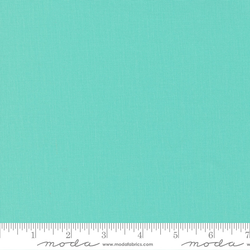 Cotton quilting fabric pattern called 'Seaglass'. Part of the 'Bella Sollids' fabric collection. Designed by Moda Fabrics for fabric company Moda Fabrics. SKU: 9900 378. 44-45 inch width.