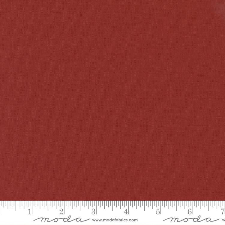Cotton quilting fabric pattern called 'Cinnamon'. Part of the 'Bella Solids' fabric collection. Designed by Moda Fabrics for fabric company Moda Fabrics. SKU: 9900 424. 44-45 inch width.