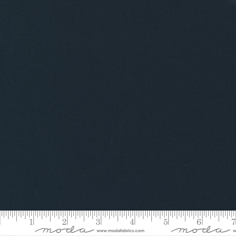 Cotton quilting fabric pattern called 'Peacoat'. Part of the 'Bella Solids' fabric collection. Designed by Moda Fabrics for fabric company Moda Fabrics. SKU: 9900 44. 44-45 inch width.