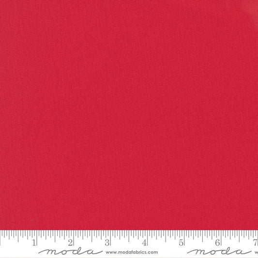 Cotton quilting fabric pattern called 'Scarlet'. Part of the 'Bella Solids' fabric collection. Designed by Moda Fabrics for fabric company Moda Fabrics. SKU: 9900 47. 44-45 inch width.