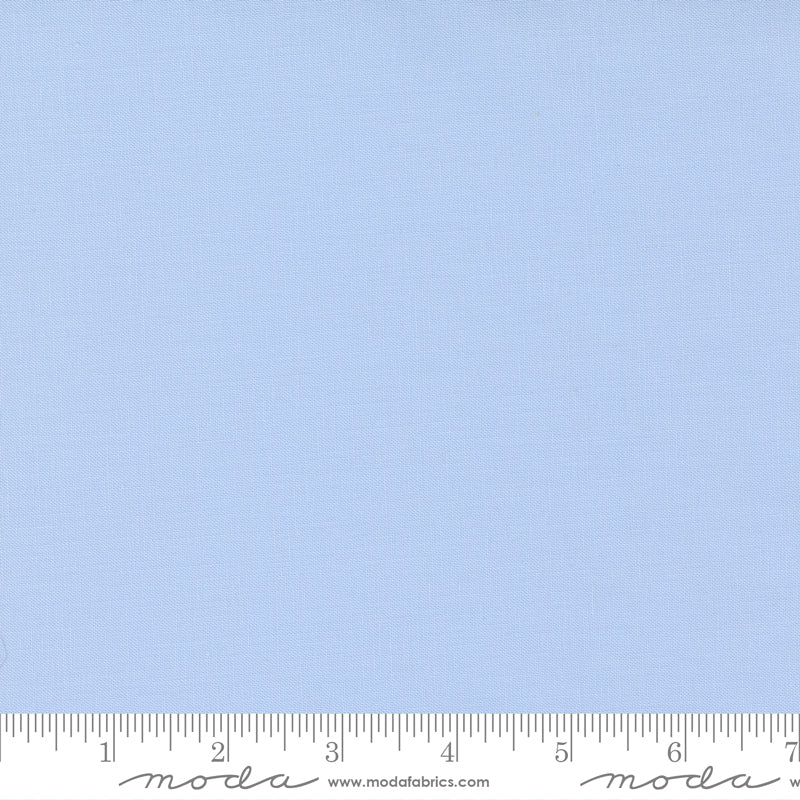 Cotton quilting fabric pattern called 'Light Blue'. Part of the 'Bella Solids' fabric collection. Designed by Moda Fabrics for fabric company Moda Fabrics. SKU: 9900 63. 44-45 inch width.