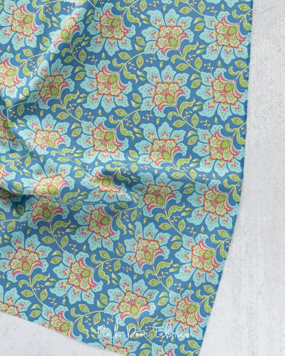 Cotton quilting fabric pattern called 'Flowermarket in Blueberry'. Part of the 'Bloomsville' fabric collection. Designed by Tilda Fabrics for fabric company Tilda Fabrics. SKU: 100506. 44-45 inch width.