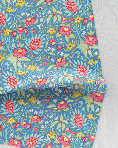 Cotton quilting fabric pattern called 'Flowertangle in Blue'. Part of the 'Bloomsville' fabric collection. Designed by Tilda Fabrics for fabric company Tilda Fabrics. SKU: 100509. 44-45 inch width.