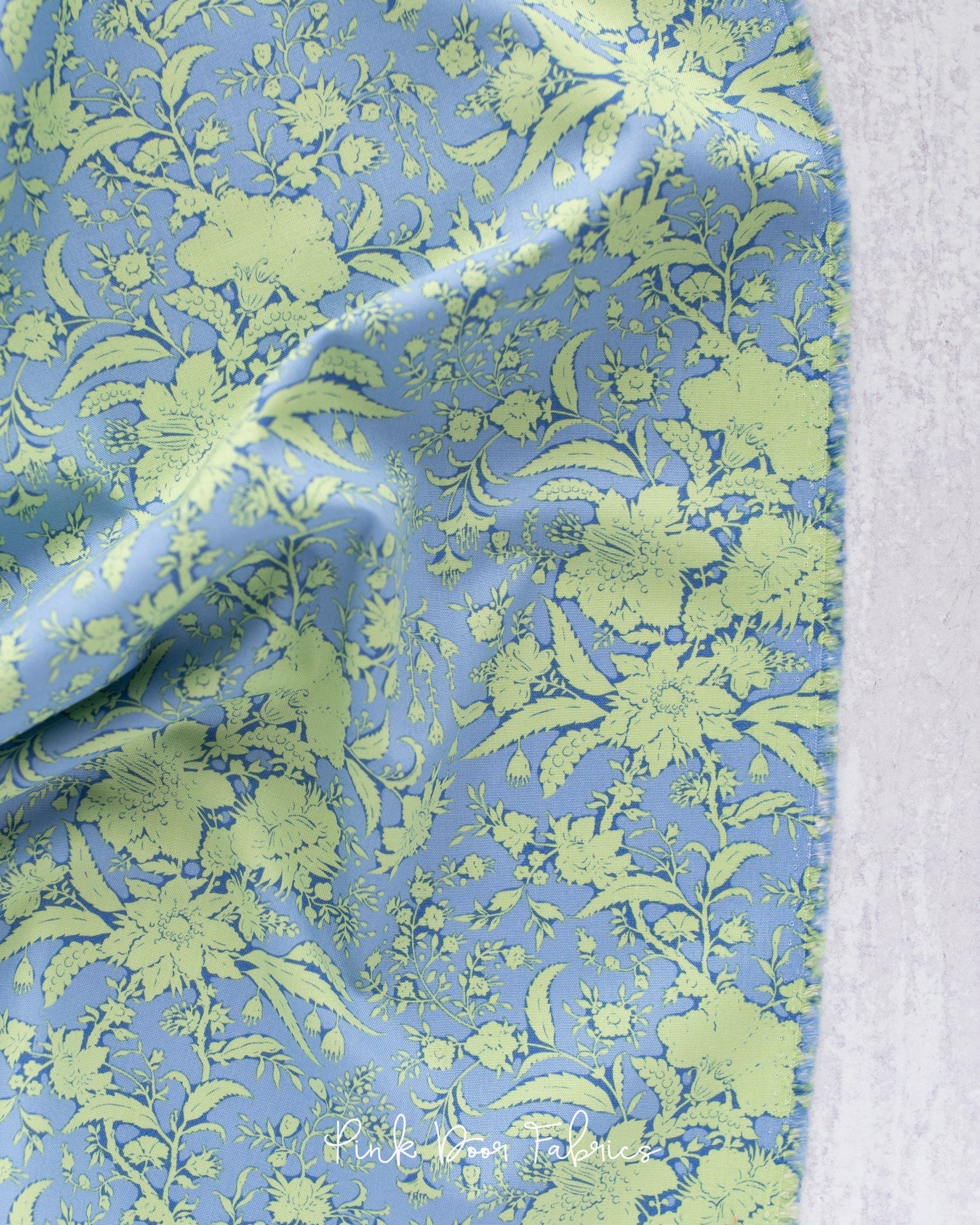 Cotton quilting fabric pattern called 'Abloom in Cornflower'. Part of the 'Bloomsville' fabric collection. Designed by Tilda Fabrics for fabric company Tilda Fabrics. SKU: 110075. 44-45 inch width.