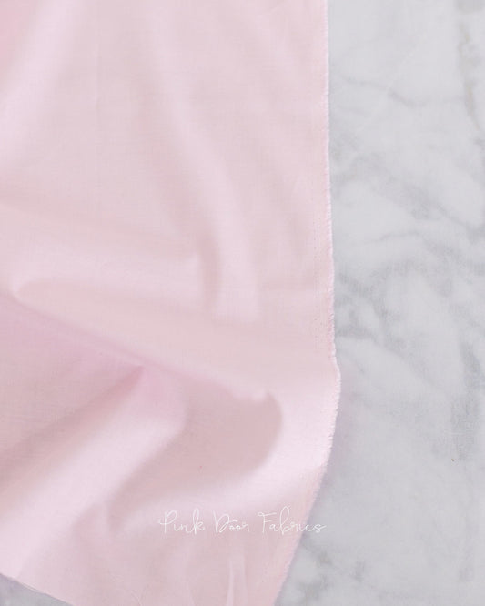 Cotton quilting fabric pattern called 'Unicorn Poop in Giggles'. Part of the 'True Colors' fabric collection. Designed by Tula Pink for fabric company Free Spirit Fabrics. SKU: CSFSESS.GIGGLES. 44-45 inch width.